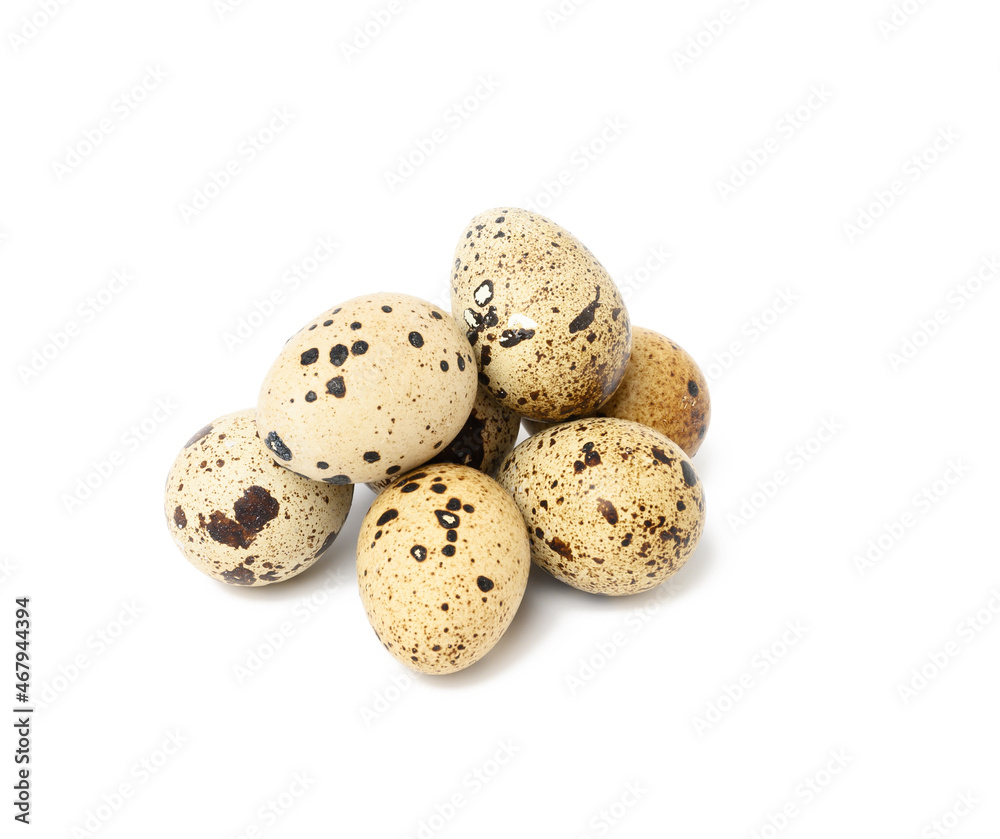 bunch of raw quail eggs isolated on white background, diet food