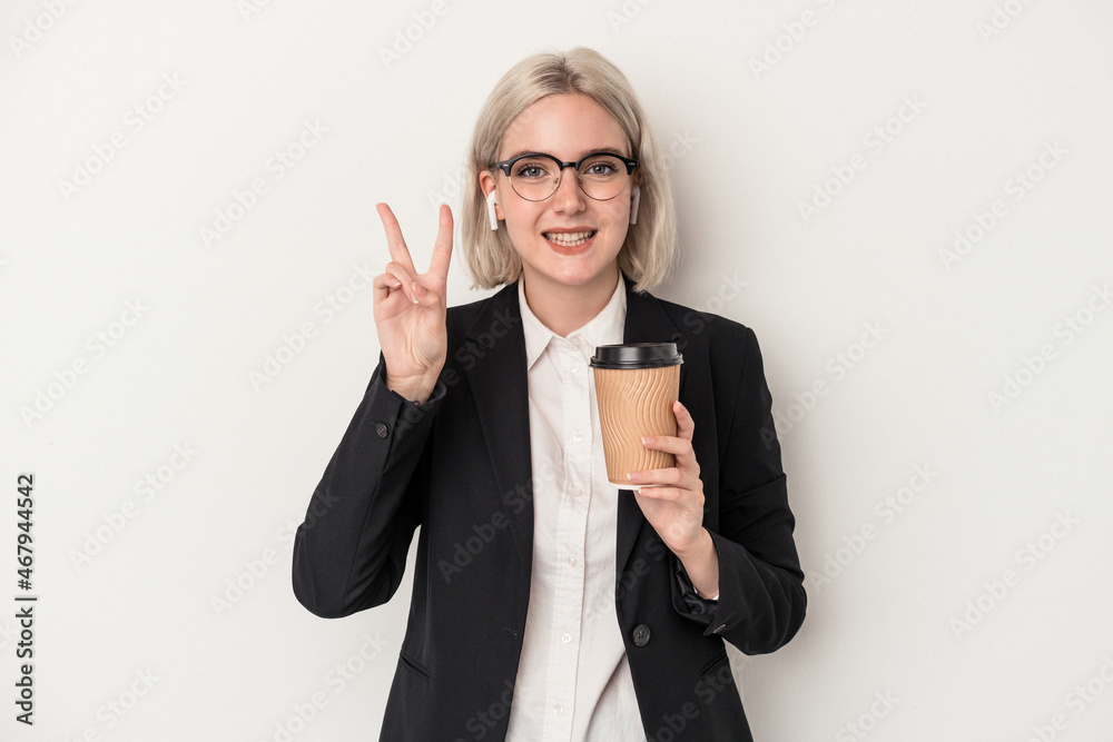 Young caucasian business woman holding take away coffee isolated on white background showing number two with fingers. Young caucasian business woman holding take away coffee isolated on white background showing number two with fingers.