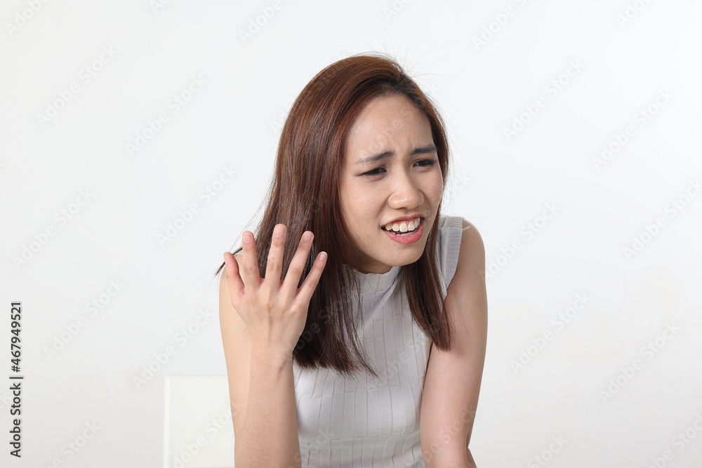 Young attractive Asian chinese malay woman pose face body expression mode emotion on white background question what angry Young attractive Asian chinese malay woman pose face body expression mode emotion on white background question what angry