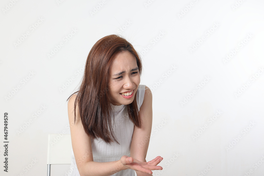 Young attractive Asian chinese malay woman pose face body expression mode emotion on white background question what Young attractive Asian chinese malay woman pose face body expression mode emotion on white background question what