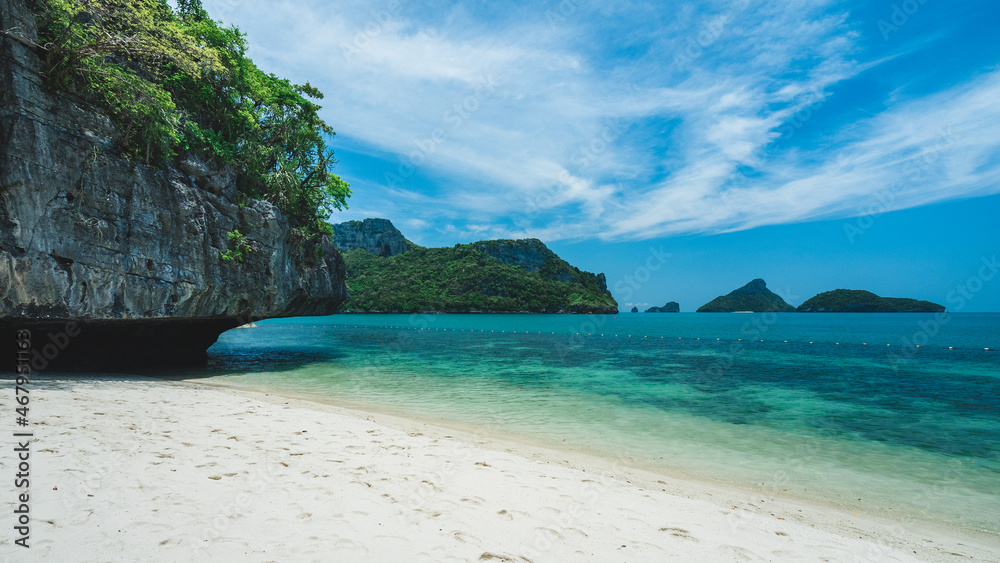 White sand beach rock formation island with turquoise water. Mae Ko Island, Mu Koh Ang Thong, near Koh Samui Island, Thailand.