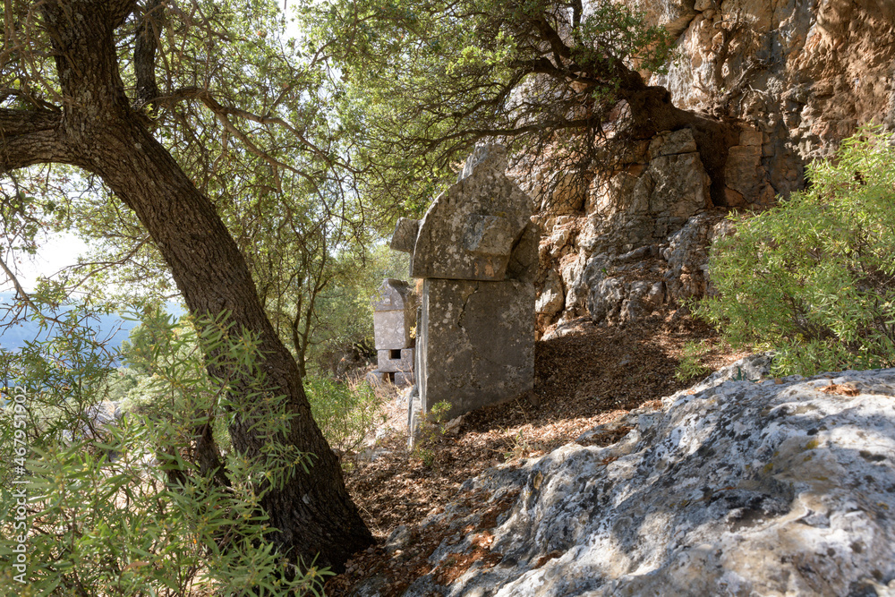 Lycian sarcophagus tombs in acient city Kyaneai. Lycian sarcophagus tombs in acient city Kyaneai.