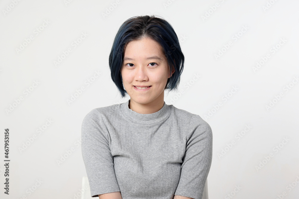 Young attractive Asian chinese malay woman pose face body expression mode emotion on white background laugh smile happy Young attractive Asian chinese malay woman pose face body expression mode emotion on white background laugh smile happy