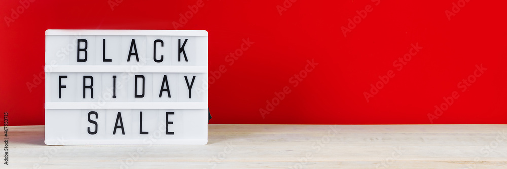 Black Friday concept. Sign on red background.