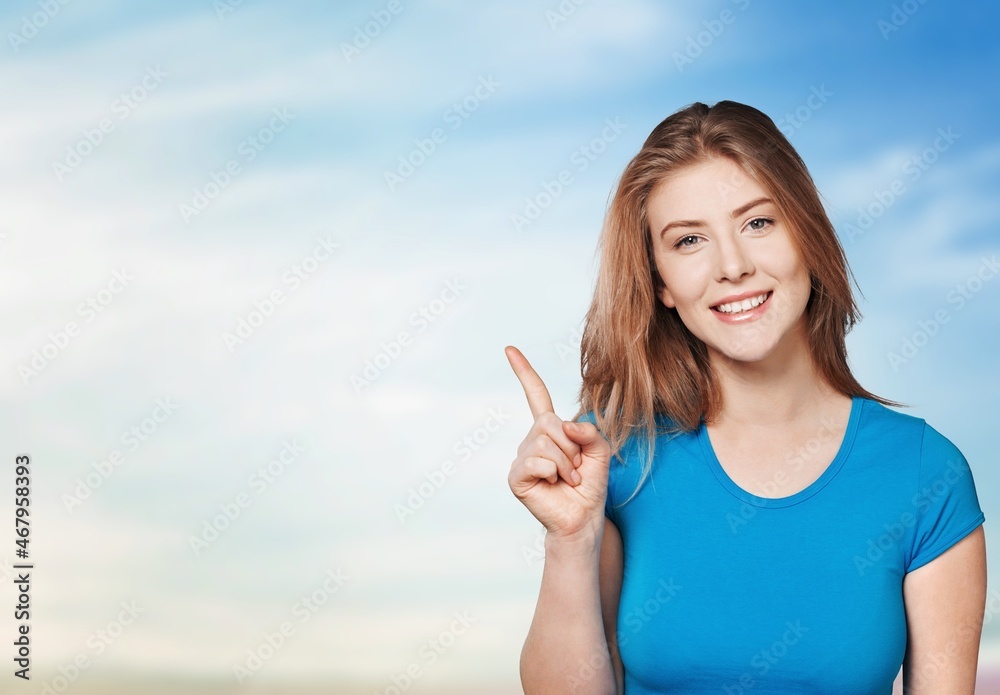 Friendly cheerful girl inviting visit link interesting place, pointing Friendly cheerful girl inviting visit link interesting place, pointing