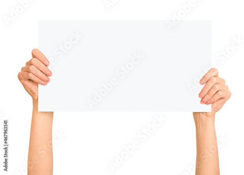 female hands holding white sign isolated on white background