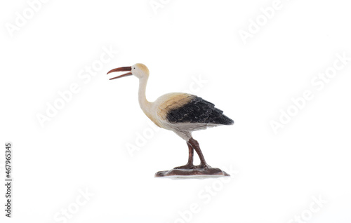 toy plastic stork isolated on white background