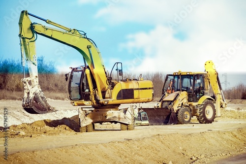 Construction site is laying new asphalt road pavement  machinery scene.