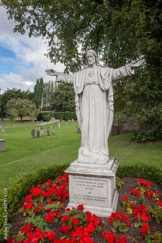 Photography City of Dublin Ireland. Statue of Jezus in Park.