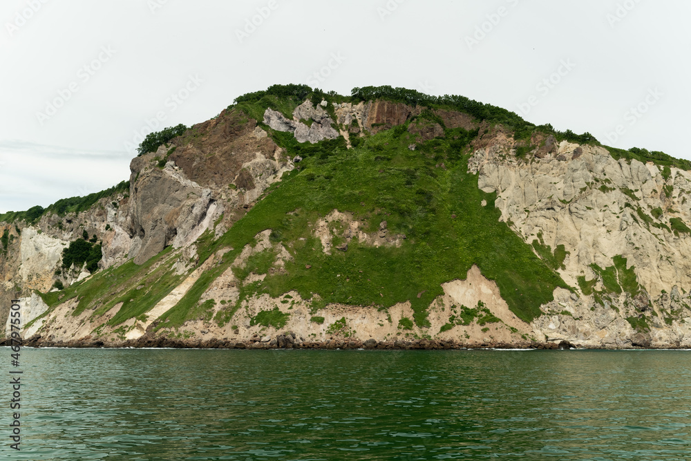 Fototapeta premium View from ocean side on the cliff in Kamchatka