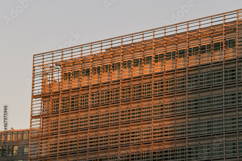 Brussels, Belgium - October 2021: European Comission building during an amazing autumn sunrise. Headquarter of one of the biggest European institutions. photo