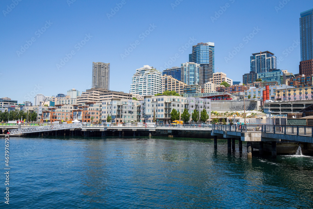 Seattle, Washington, USA - June 4 2021: Seattle skyline during summer. View from Seattle Aquarium. Space Needle. Seattle, Washington, USA - June 4 2021: Seattle skyline during summer. View from Seattle Aquarium. Space Needle.
