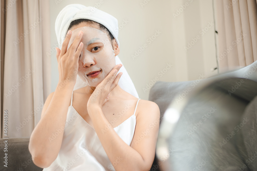 Asian woman with cosmetic face mask skincare to body healthy treatment spa Asian woman with cosmetic face mask skincare to body healthy treatment spa