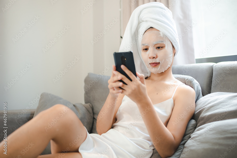 Asian woman with cosmetic face mask skincare to body healthy treatment spa Asian woman with cosmetic face mask skincare to body healthy treatment spa