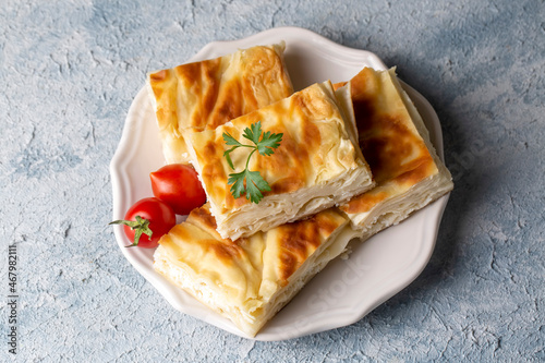 Delicious Turkish food; Tray pastry; (Turkish name; Su boregi) photo