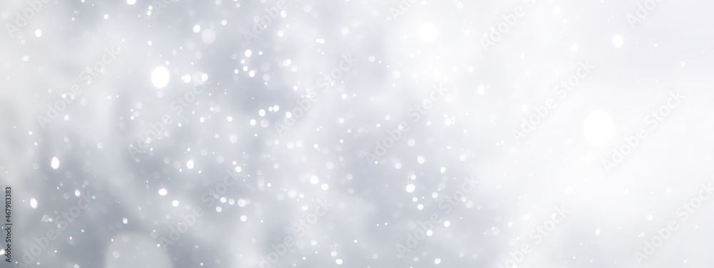 blue snowfall bokeh background, abstract snowflake background on blurred abstract blue