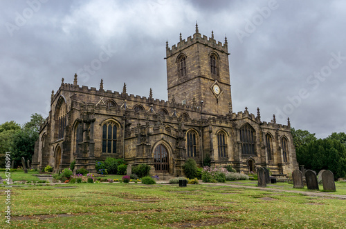 A Photograph of an Ancient, Aged Church in Sheffield, England, With dramatic clouds.