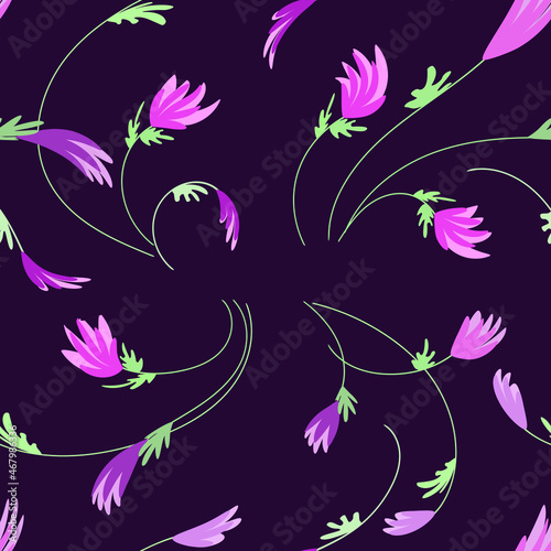 Dynamic floral seamless pattern on a dark purple background. Pink and lilac flowers. Vector illustration. Used for printing wallpapers, fabrics, packaging, etc.