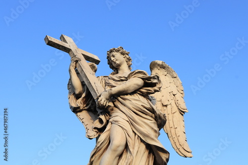 Angel With the Cross Statue Detail on the Ponte Sant'Angelo Bridge in Rome, Italy