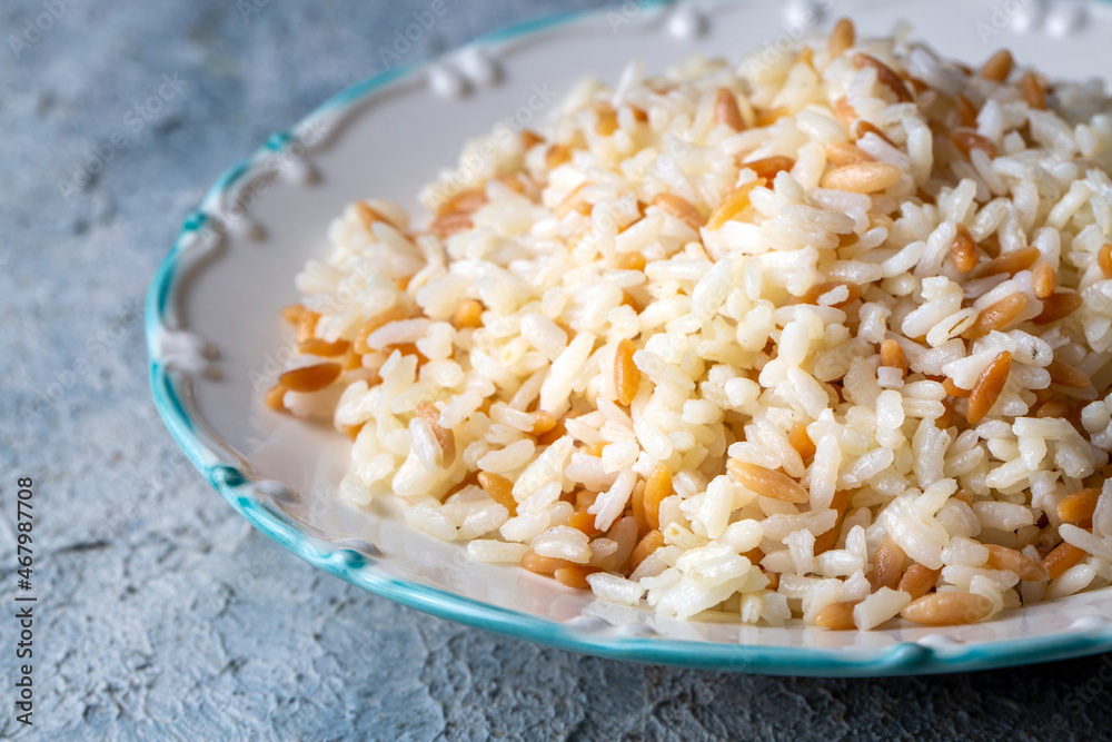 Traditional delicious Turkish food; Turkish style rice pilaf (Turkish name; Arpa sehriyeli pirinc pilavi) Traditional delicious Turkish food; Turkish style rice pilaf (Turkish name; Arpa sehriyeli pirinc pilavi)