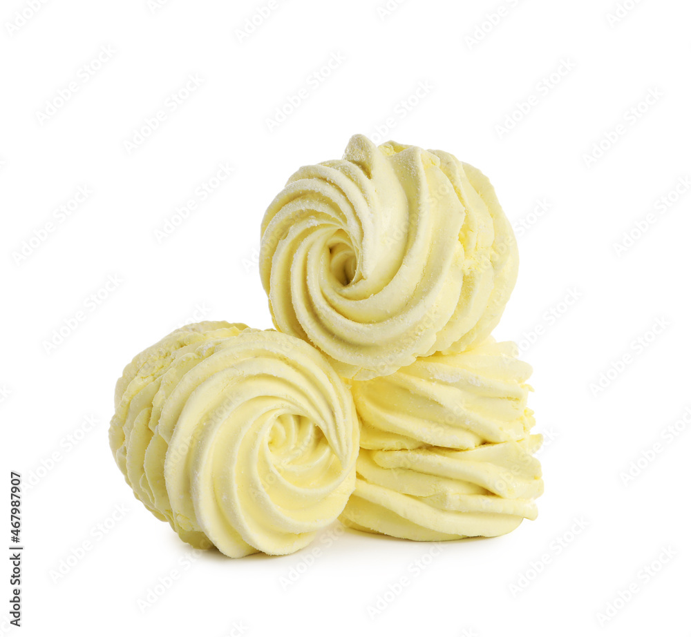 Many delicious yellow zephyrs on white background Many delicious yellow zephyrs on white background