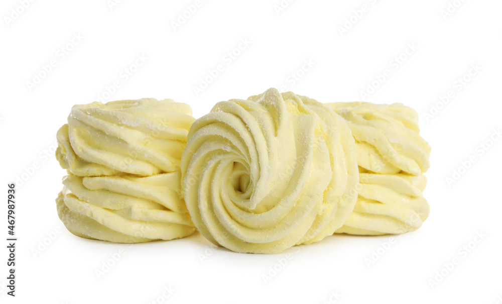 Many delicious yellow zephyrs on white background Many delicious yellow zephyrs on white background