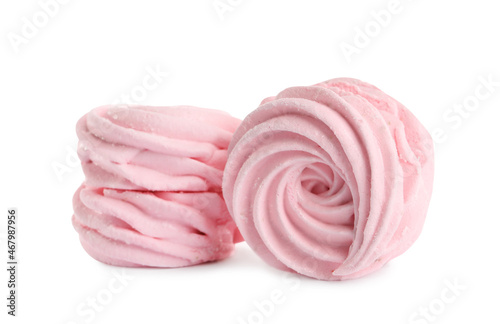 Two delicious pink zephyrs on white background photo