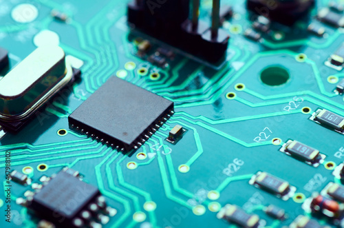 Fotografering electronic board with processor and electronic components close-up, soft focus