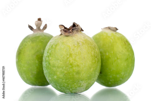 Three ripe sweet feijoa fruits, close-up, isolated on white.