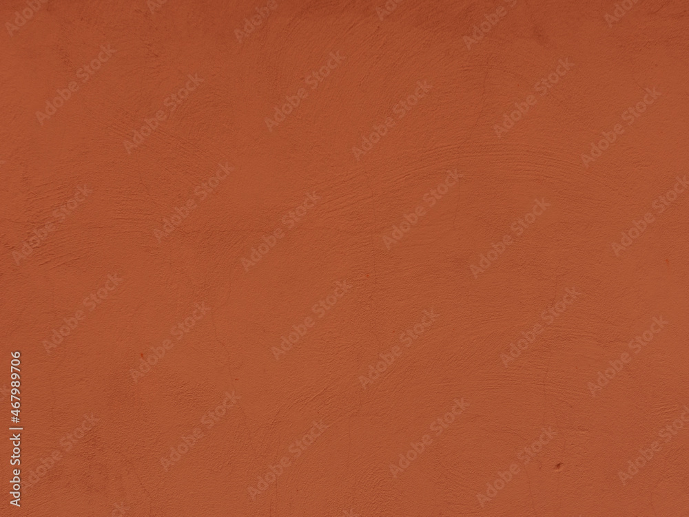 Abstract background from old orange paint on the wall. Abstract background from old orange paint on the wall.