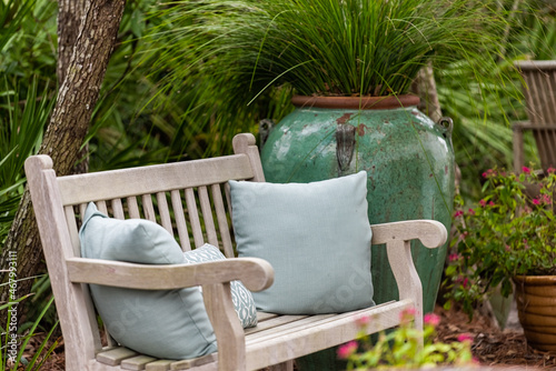 Принти на полотні Outdoor green garden beach patio wooden bench in backyard porch of home with nob