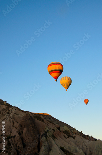 Air balloons festival in Cappadocia. Three hot air balloons against colorful vibrant sky