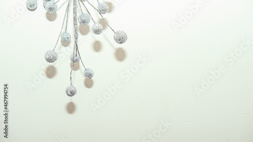 creative inverted Christmas tree made of silver berries and branches 