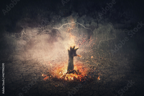 Hand on fire rising out from the ground Fototapet