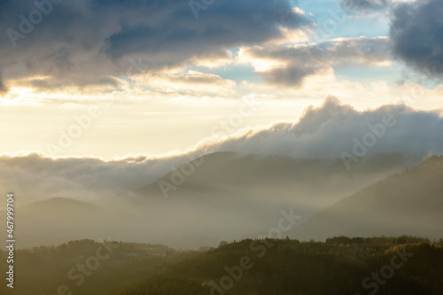 Mist in the mountains in autumn. © bios48