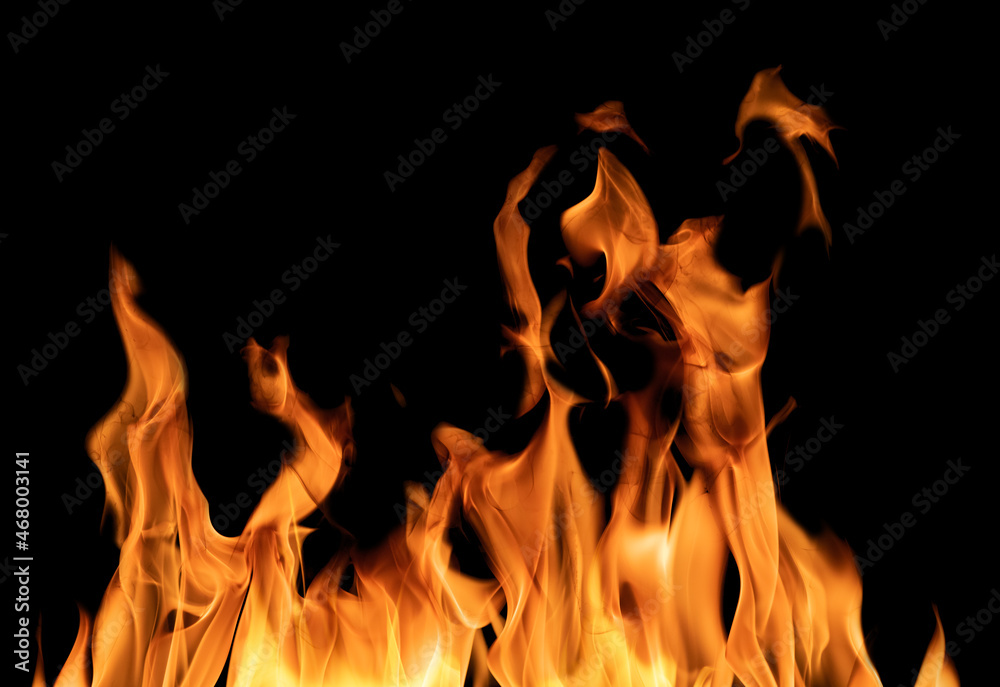 Fototapeta premium yellow flame hot sparks isolated on black