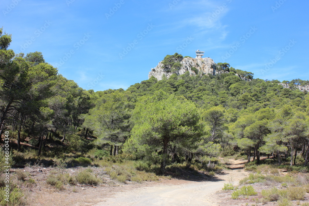 Beautiful view over the Narbonnaise Regional Natural Park on the Mediterranean, massif de la Clape, with a view of the lookout. Photo was taken on a very hot day at the end of summer.