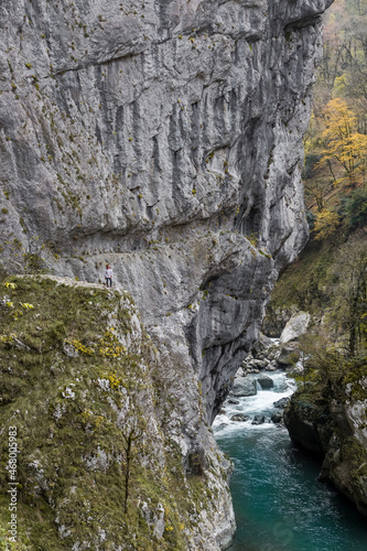 view of the steep cliff and mountain river, nature view © doctor299
