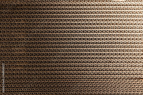 a stack of corrugated cardboard for packaging. Paper background photo