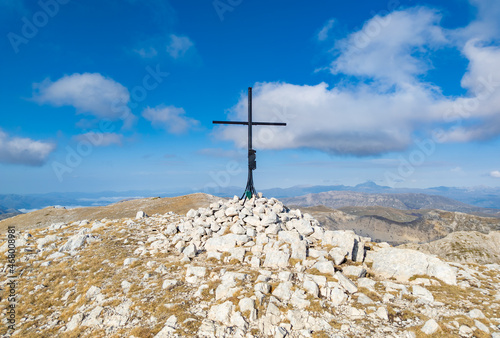Monte Velino (Italy) - The beautiful landscape summit of Mount Velino, one of the highest peaks of the Apennines with its 2487 meters. In the Sirente-Velino natural park, Abruzzo region. photo