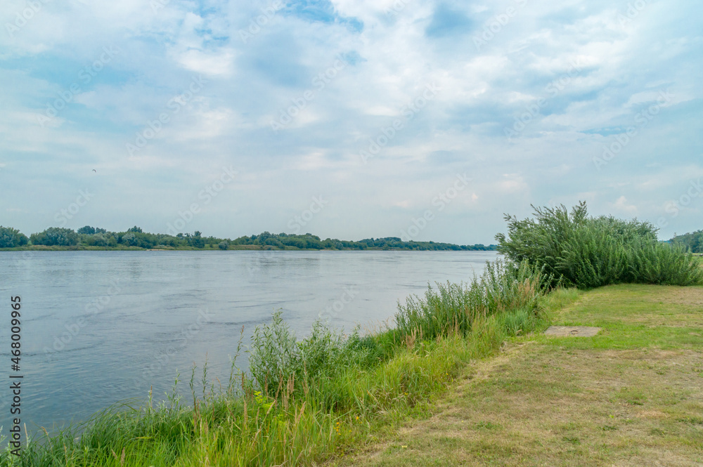 The Vistula River against the cloudy sky.