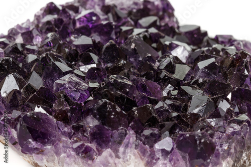 Amethyst Crystal Druse macro mineral on white background close up