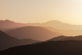 Silhouette of mountains in the setting rays of the sun, Peloponnese, Greece