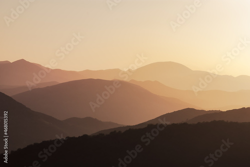 Silhouette of mountains in the setting rays of the sun, Peloponnese, Greece