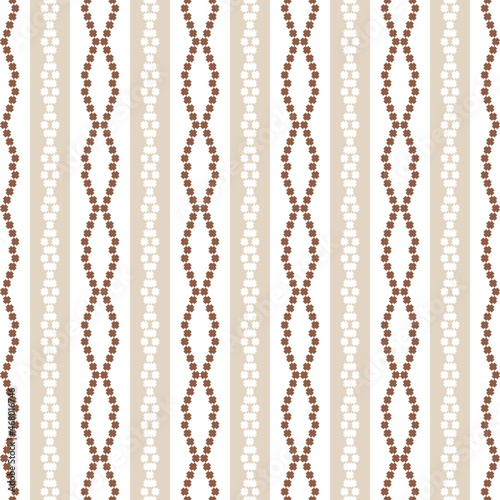 Geometric seamless pattern of brown coffee squares in a flat style ornament in the form of pixels. Vertical embroidery dotted schemes. Textile geo prints.