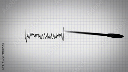 Seismometer scale drawing waves of an earthquake on a paper. Measuring the magnitude of a volcanic activity or a quake. Richter scale detecting the intensity of shaking photo