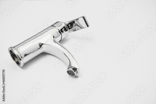 Single handle water tap isolated on white