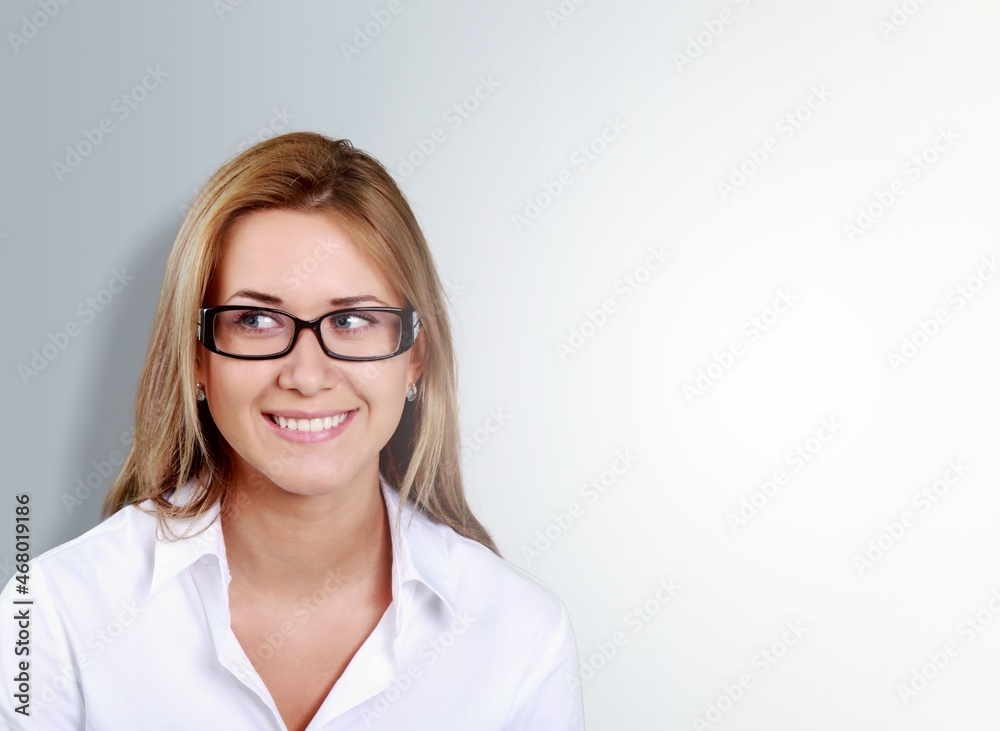 Portrait of happy woman smiling at the camera, standing cute