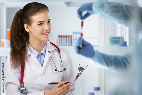 Medical Research Laboratory  Scientist Using Tablet to Analyse Data.