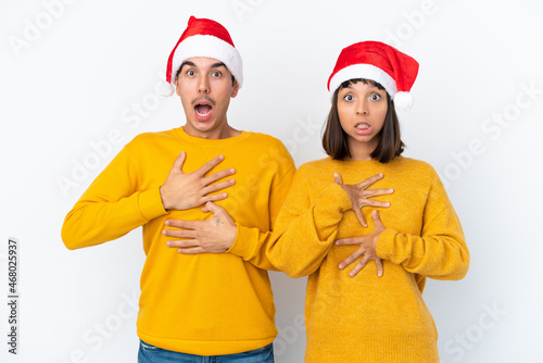 Photography Young mixed race couple celebrating Christmas isolated on white background surpr